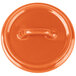 A Bon Chef orange porcelain lid with a handle.