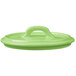 A green Bon Chef oval cocotte lid with a handle.
