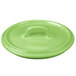 A green Bon Chef porcelain lid with a handle.