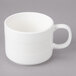 A white Bon Chef porcelain cup with a handle.