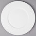 A white Bon Chef bone china charger plate with a wide white rim.
