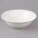 A white Bon Chef porcelain bowl with a circle pattern.