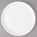 A white Bon Chef porcelain plate with a rim.