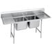 An Advance Tabco stainless steel two compartment sink with two drainboards.