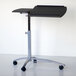 A Safco Eastwinds Anthracite mobile laptop caddy with wheels.