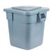 A grey Rubbermaid BRUTE trash can with a lid.