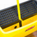 A yellow Rubbermaid bucket with holes in it.