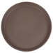 A round brown non-skid serving tray with a white background.