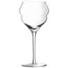 A clear Chef & Sommelier wine glass with a stem.