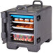 A Cambro charcoal gray front loading food container with trays and food inside.