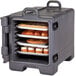 A front loading Cambro charcoal gray insulated tray and food pan carrier filled with baked goods.