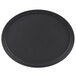 A black oval Cambro non-skid serving tray with a black rim.