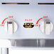 A close-up of the dial on a Cooking Performance Group 6 burner countertop range.