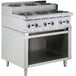 A Cooking Performance Group stainless steel gas range with storage and four burners.