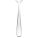 A Walco stainless steel teaspoon with a white handle and a silver spoon.