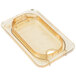 A clear plastic container with a Carlisle amber high heat hinged lid with one notch.