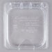 A clear plastic Carlisle 1/6 size food pan lid with one notch.