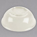 A white melamine bowl with a lid on top.