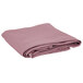 A folded pink Intedge table cover.