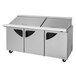 A Turbo Air 3 door stainless steel refrigerated sandwich prep table.