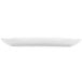 A CAC Festiware white crescent shaped salad plate with a long edge.