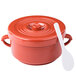 A red Thunder Group rice container with a lid and spoon.