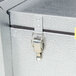 A Norlake Kold Locker indoor walk-in cooler with a metal latch.
