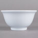 A white Thunder Group Imperial melamine rice bowl.