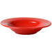 A close up of a red Thunder Group Pure Red Melamine Bowl with a white background.