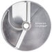 A Robot Coupe 3/8" slicing disc, a circular metal disc with a hole in the center.