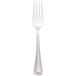 A silver Walco stainless steel cold meat fork.