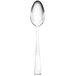A silver Walco Freya dessert spoon with a white background.