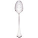 A silver Walco stainless steel pierced serving spoon with a handle.