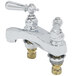 Two T&S chrome deck mount lavatory faucets with two handles and vandal resistant aerators.