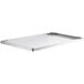 A white rectangular metal undershelf for a Regency stainless steel work table.