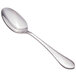 A Walco stainless steel dessert spoon with an ironstone handle.