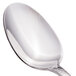 A Walco stainless steel dessert spoon with an ironstone handle.