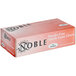 A pink box of Noble Powder-Free Nitrile Gloves with black text.