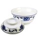 A white Thunder Group noodle bowl with a blue lotus flower pattern.