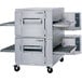 A Lincoln 1400 Series double conveyor radiant oven with a metal lid open.