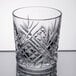 An Arcoroc clear glass with a diamond pattern.