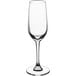 A close-up of a clear Acopa Radiance flute wine glass.
