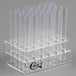 A clear plastic test tube rack holding multiple clear test tubes.