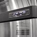 A close-up of a Turbo Air M3 Series dual temperature reach-in refrigerator/freezer with a digital display.