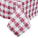 A white vinyl table cover with red and white checkered gingham pattern.