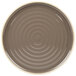 A brown stoneware dinner plate with a wavy white rim.