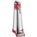 A silver metal iSi Thermo Xpress Whip Plus with a red handle.