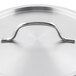 A silver curved Vigor SS1 Series stainless steel lid with a handle.