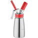 A close up of a stainless steel iSi whipped cream dispenser.