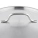 A close up of a Vigor stainless steel replacement lid for a stock pot.
